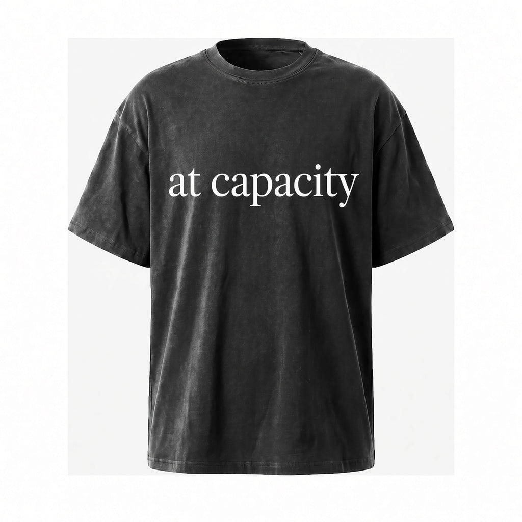 T-Shirt — "at capacity" Minimalist Vintage Washed Tee